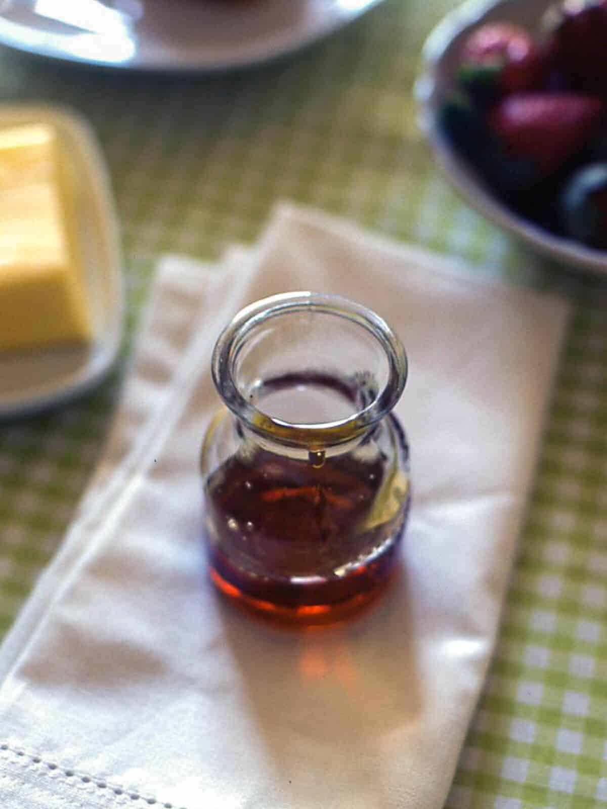 a glass jar filled with honey