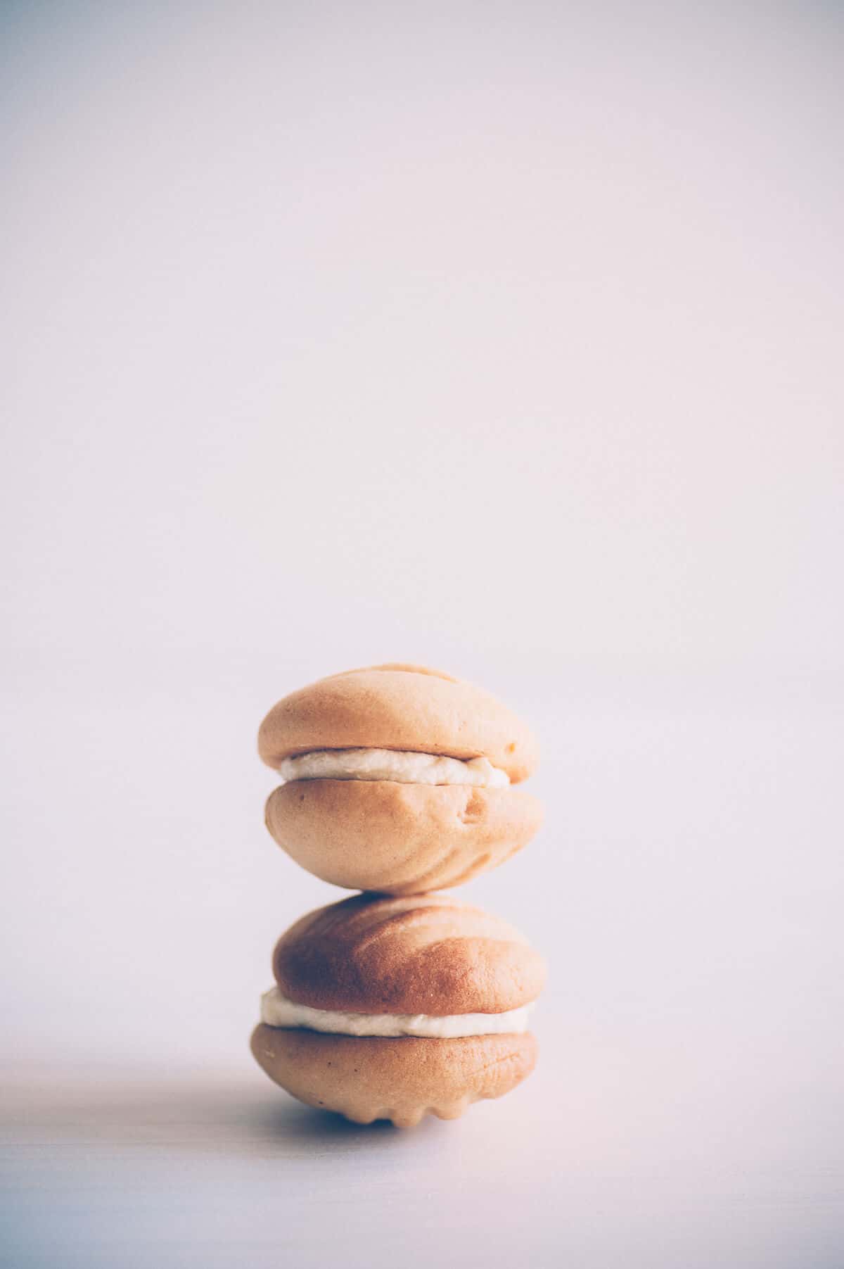 two small sandwich cookies stacked on top of each other