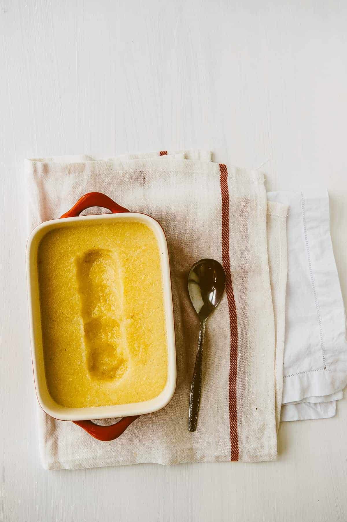 birds eye view of ceramic pan filled with homemade pineapple granita