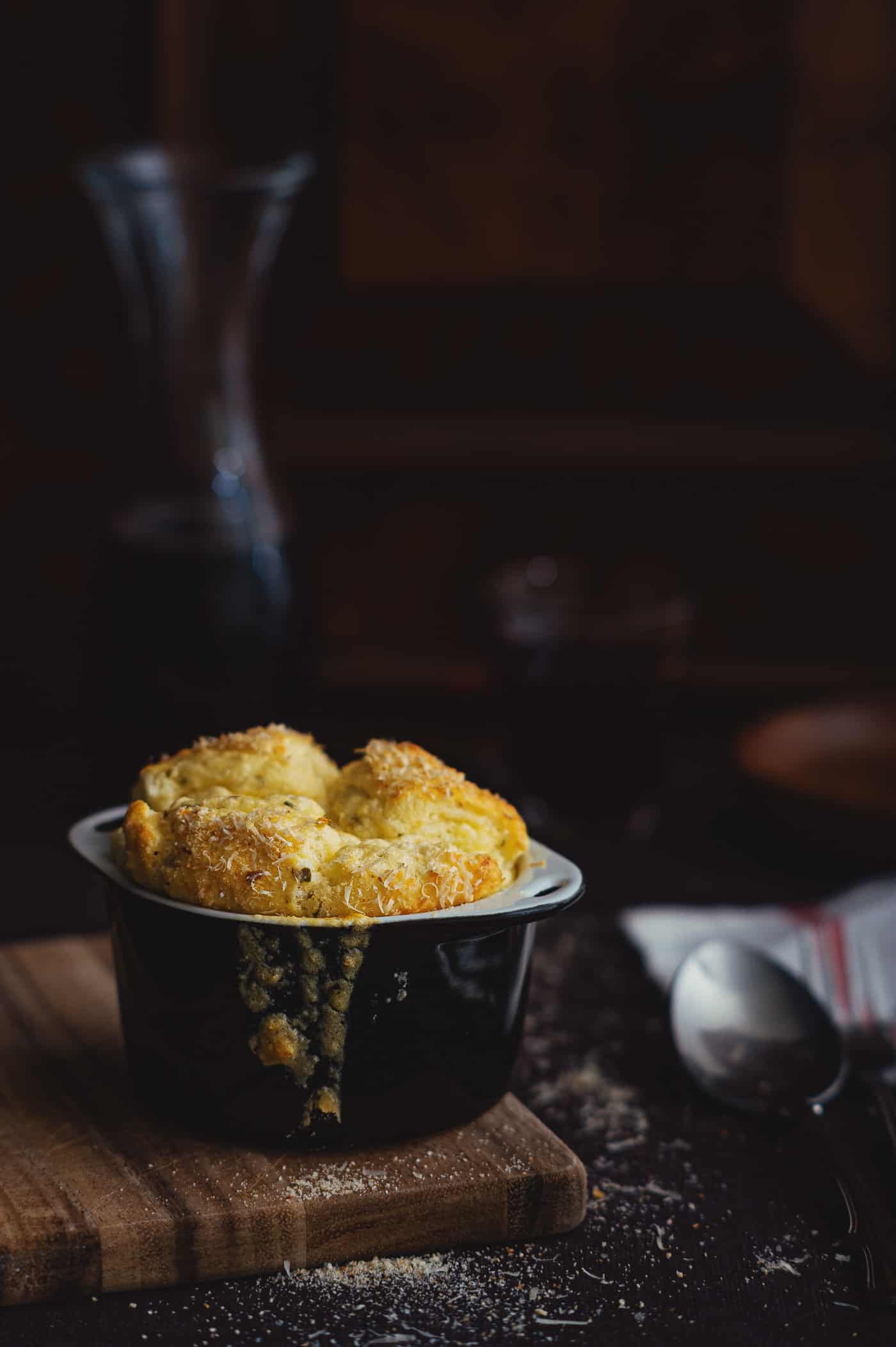 a cheese soufflé served in a ramekin