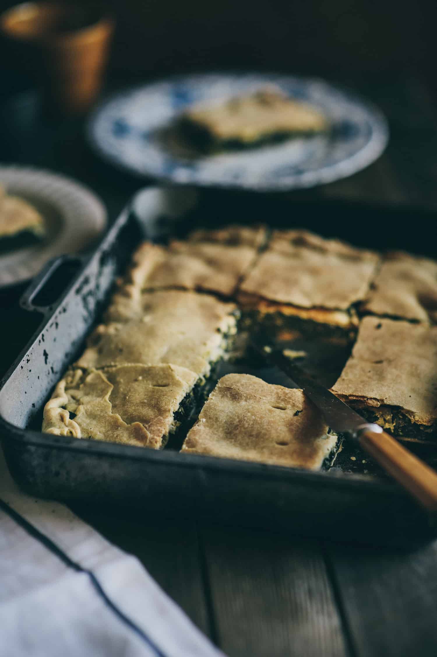 wild greens pie also known as hortopita in Greek in a baking dish