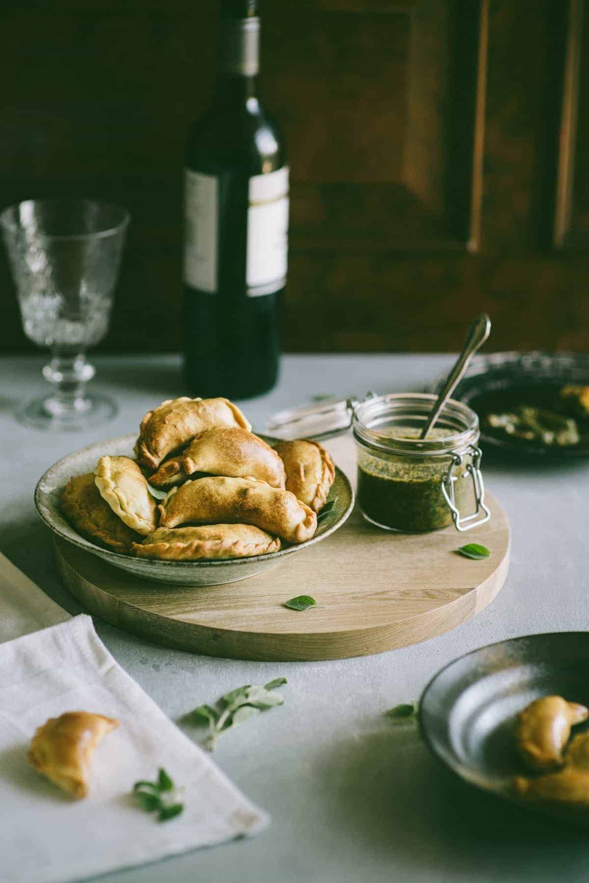 Lamb Empanadas with an oregano chimichurri dipping sauce