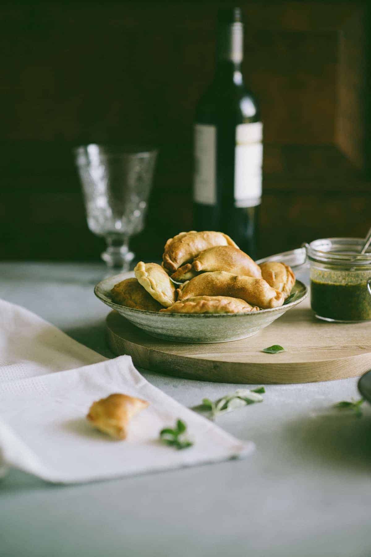 Lamb Empanadas with an oregano chimichurri dipping sauce