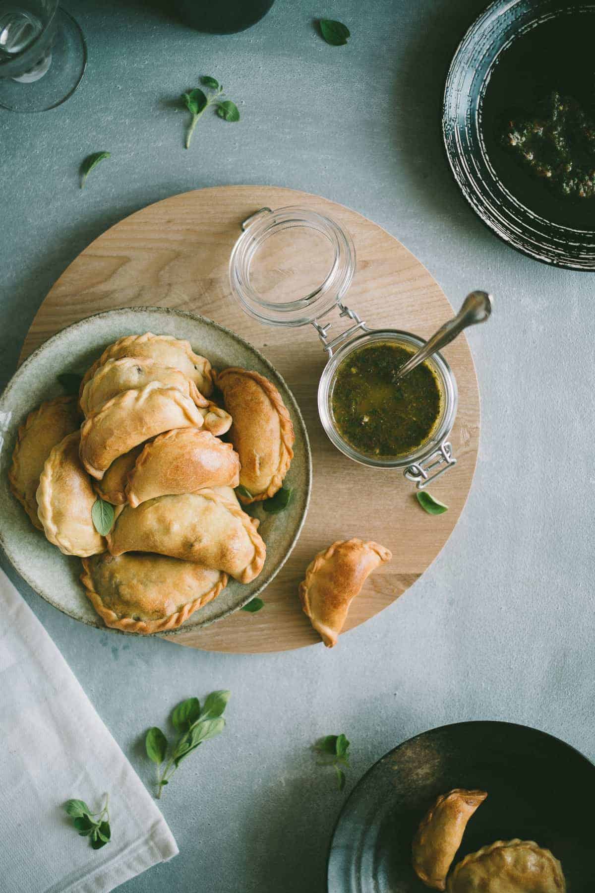 Lamb Empanadas with an oregano chimichurri dipping sauce