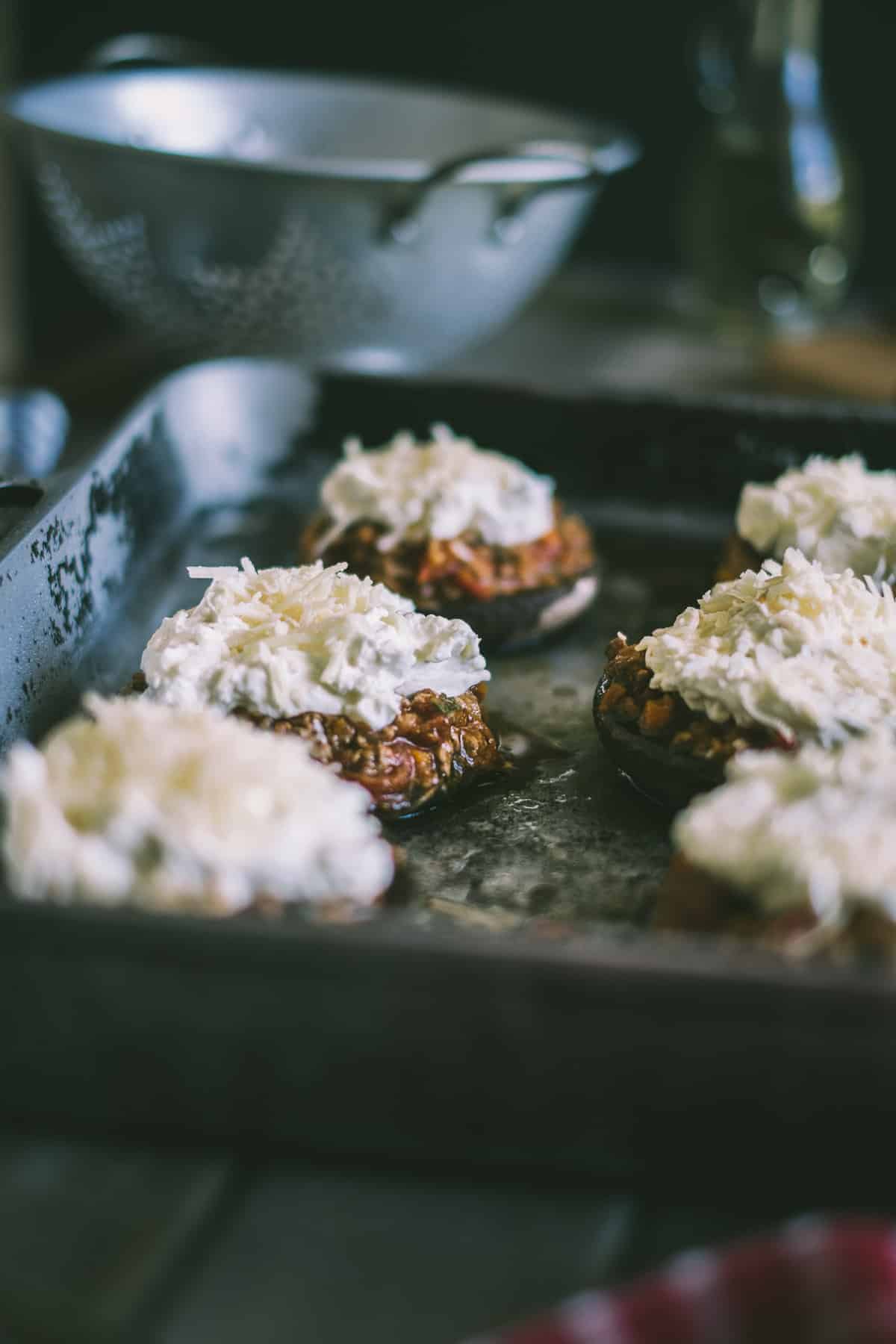 meat ragu stuffed mushrooms ready to go into the oven