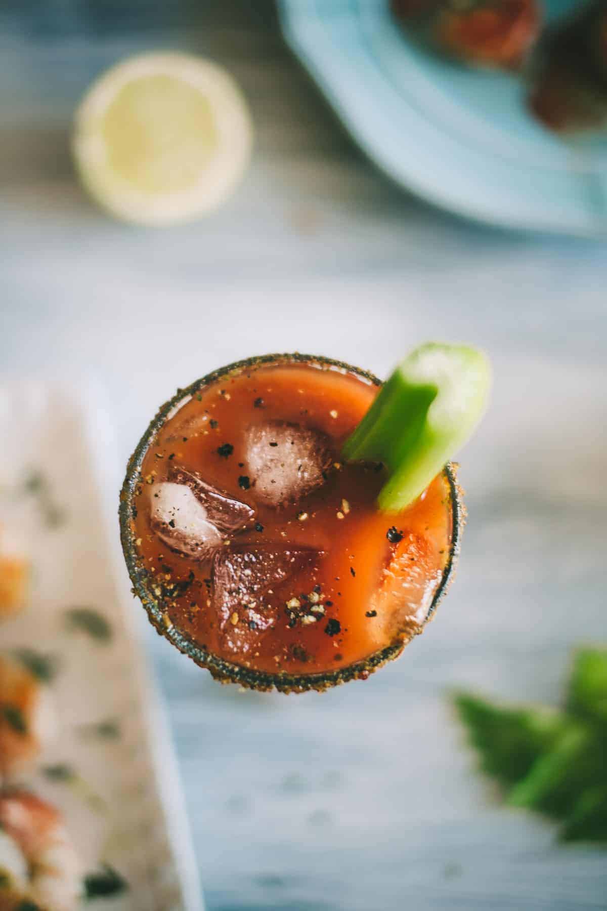 Bloody Mary cocktail with celery garnish