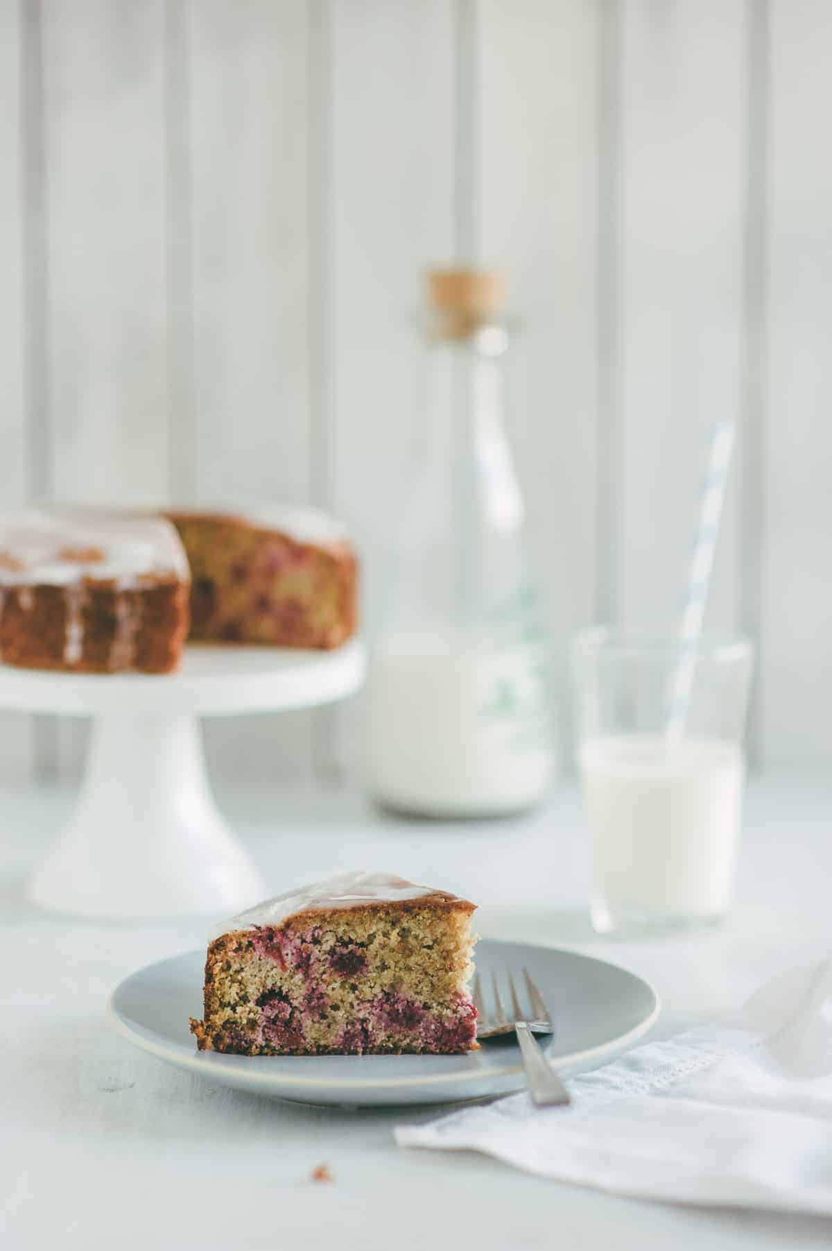 slice of cake made with almond meal and raspberries