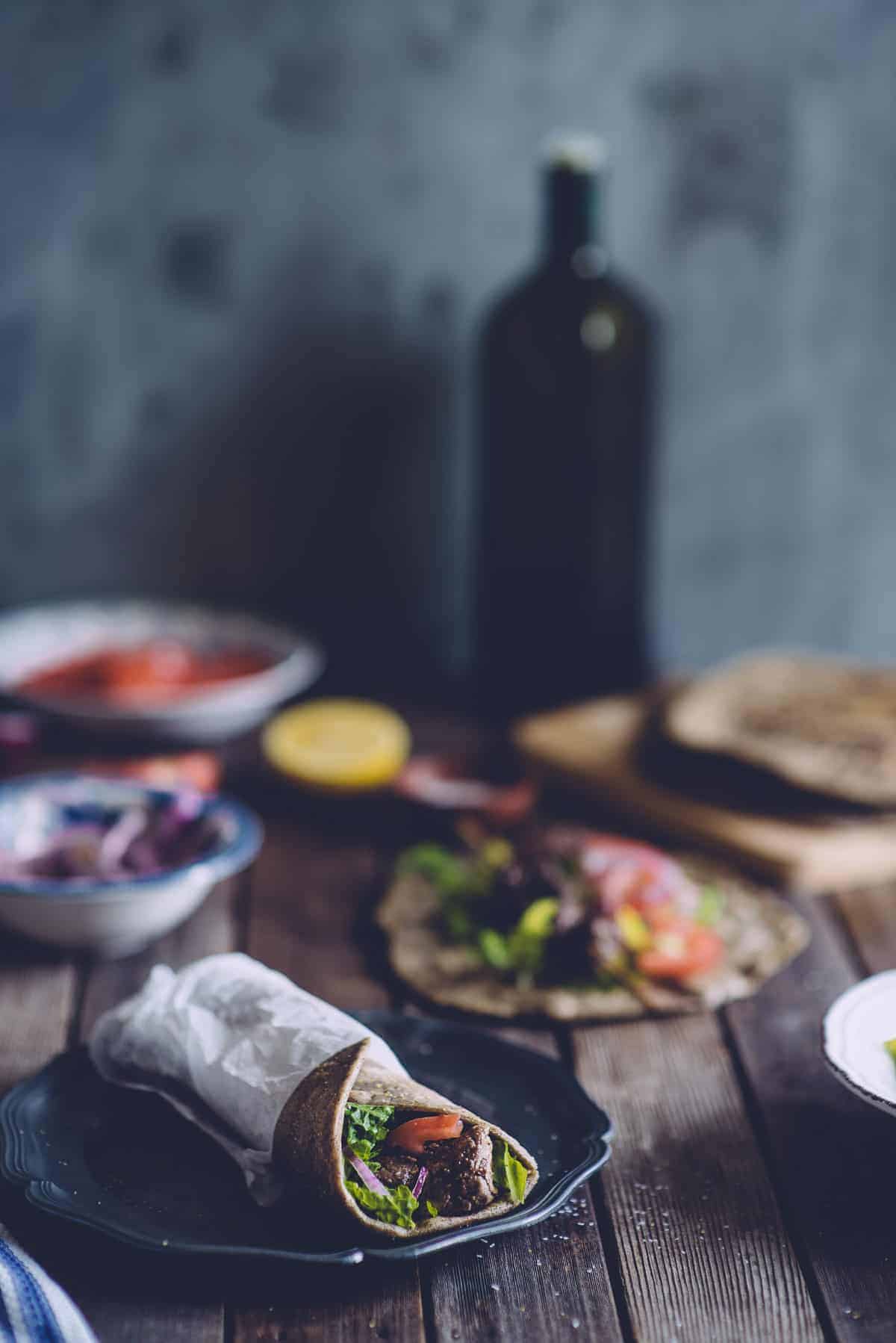 a souvlaki wrapped made with buckwheat pita bread