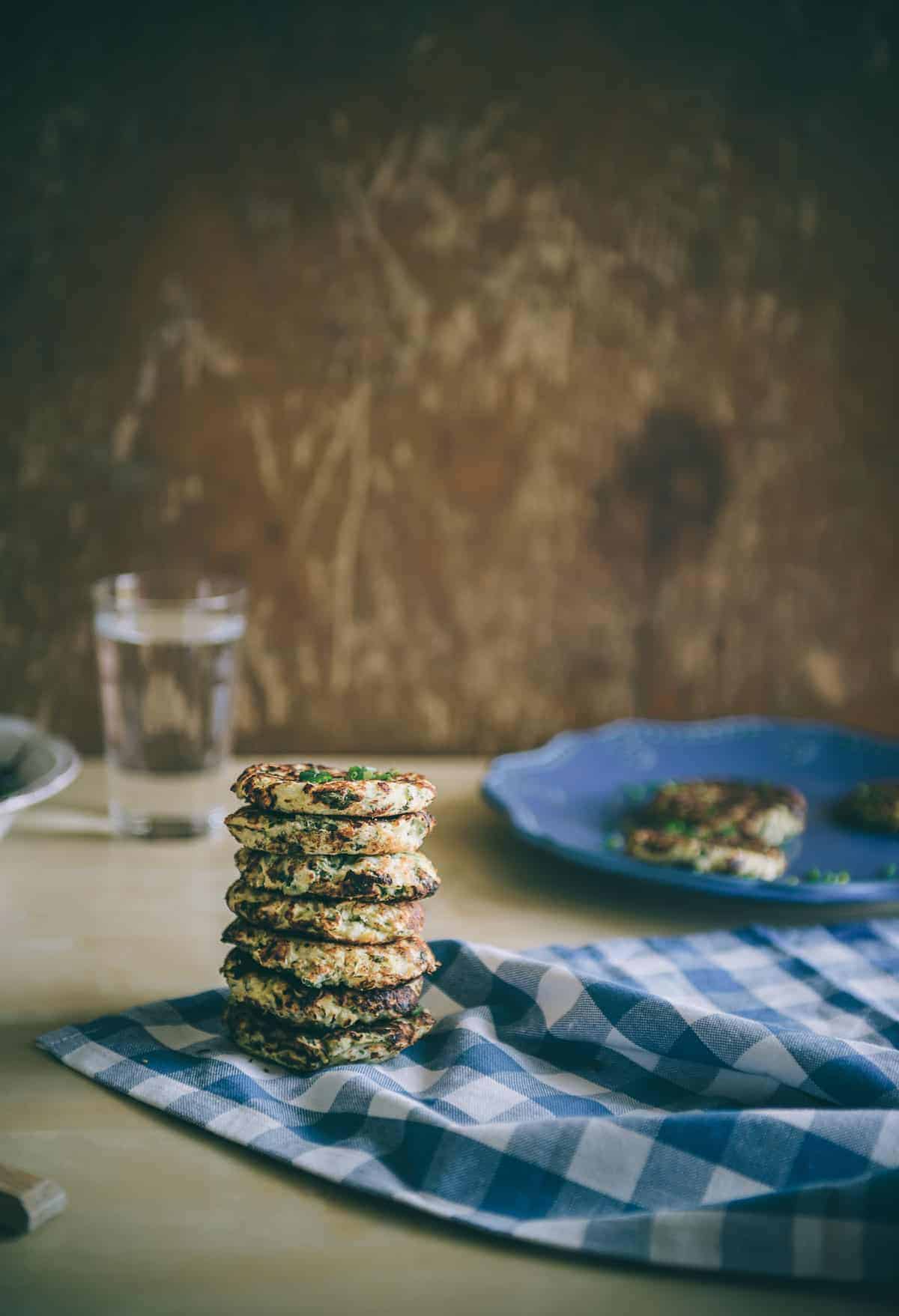 a stack of cauliflower and feta fritters