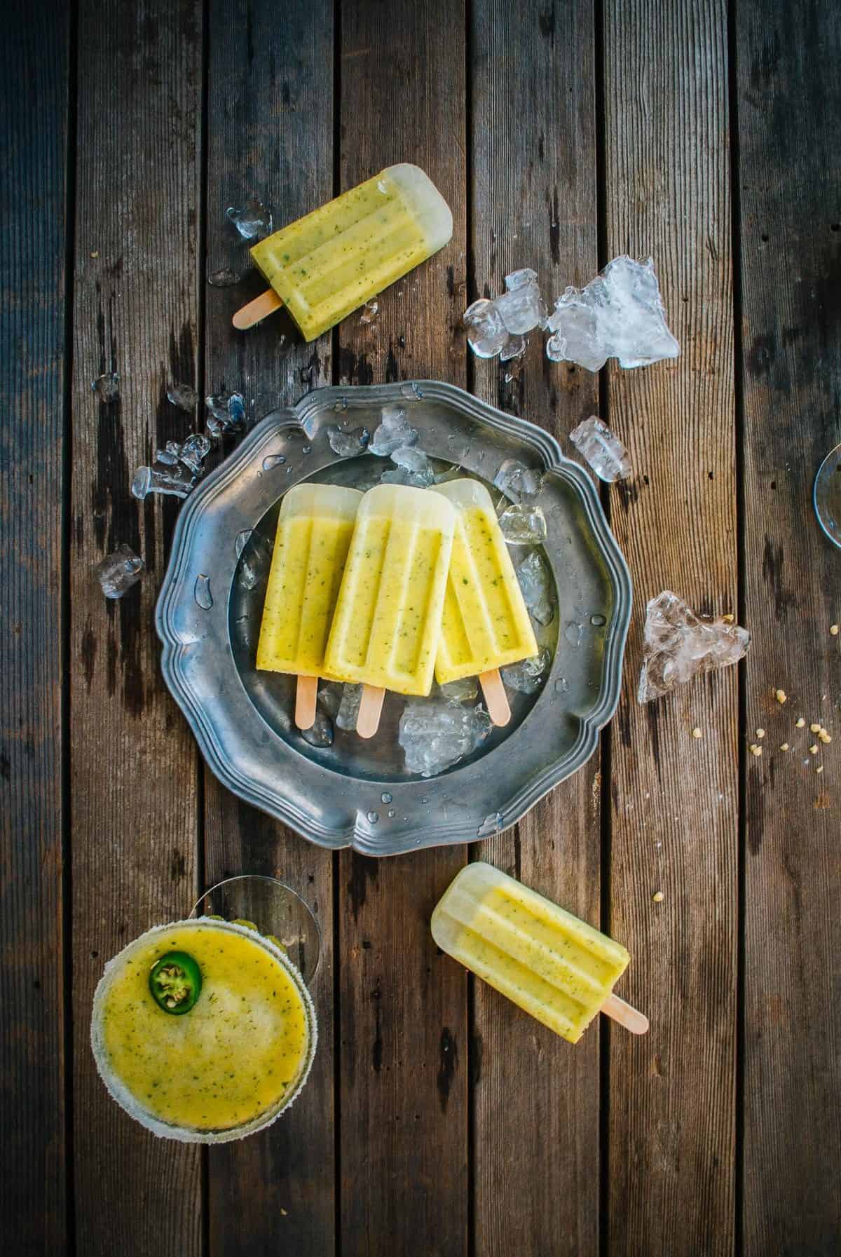 homemade pineapple margarita ice pops on a plate