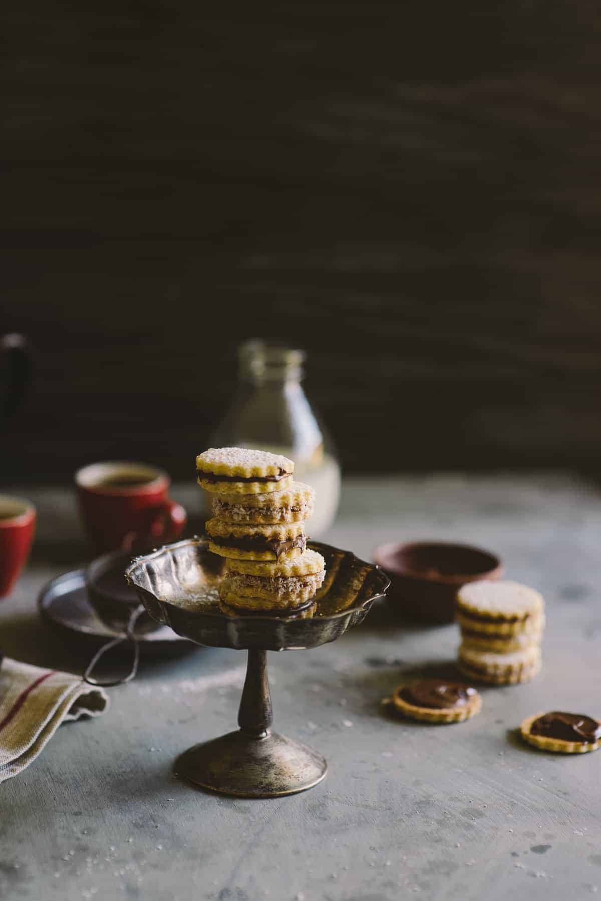 4 shortbread cookie sandwiches called alfajores filled with Nutella