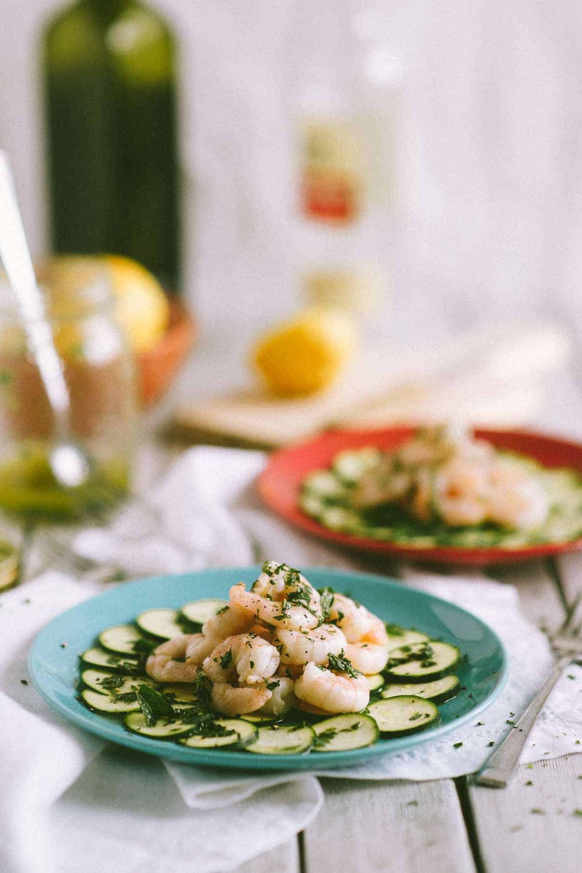 zucchini and prawn salad served on a plate