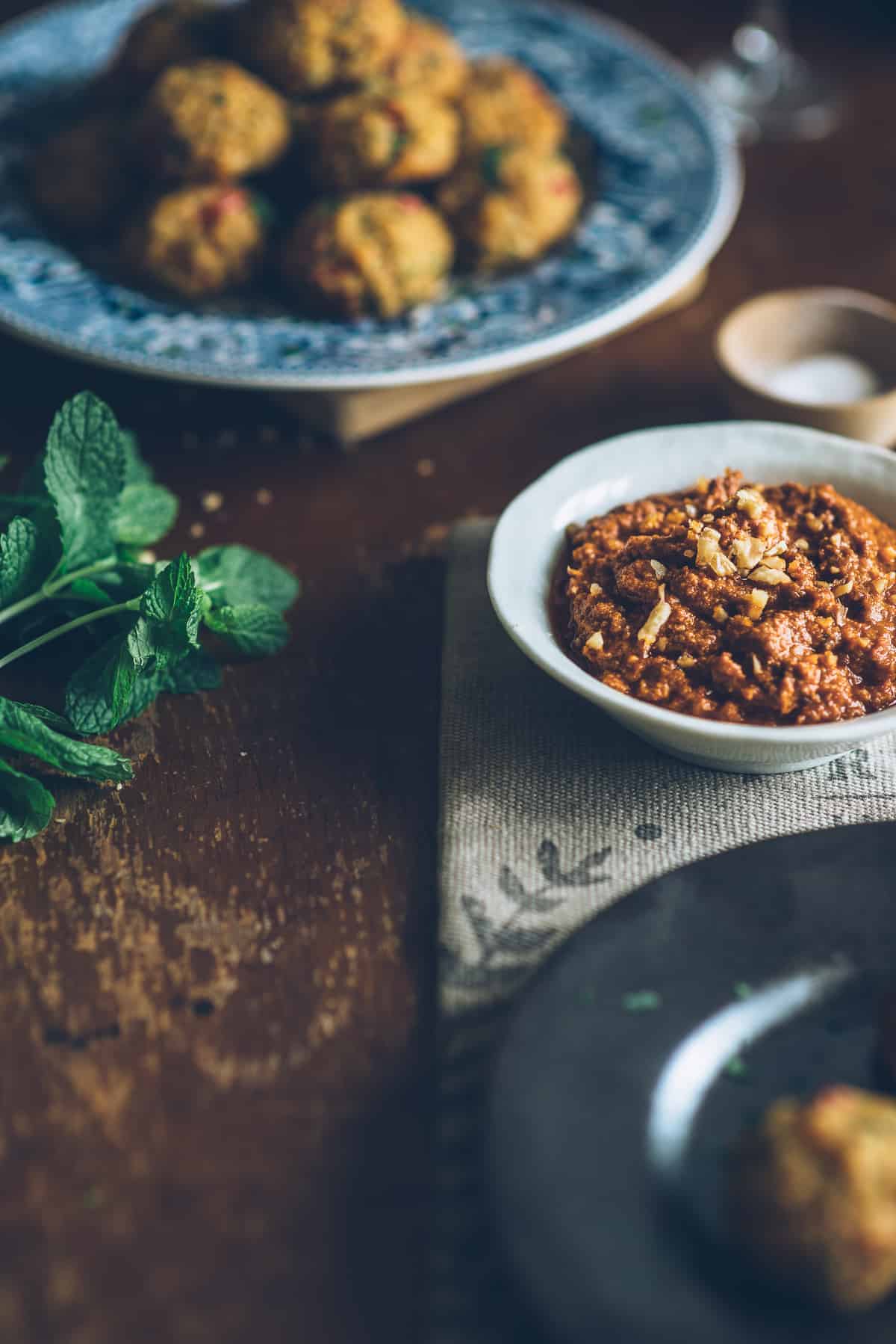 semi dried tomato and walnut dipping sauce served in a bowl