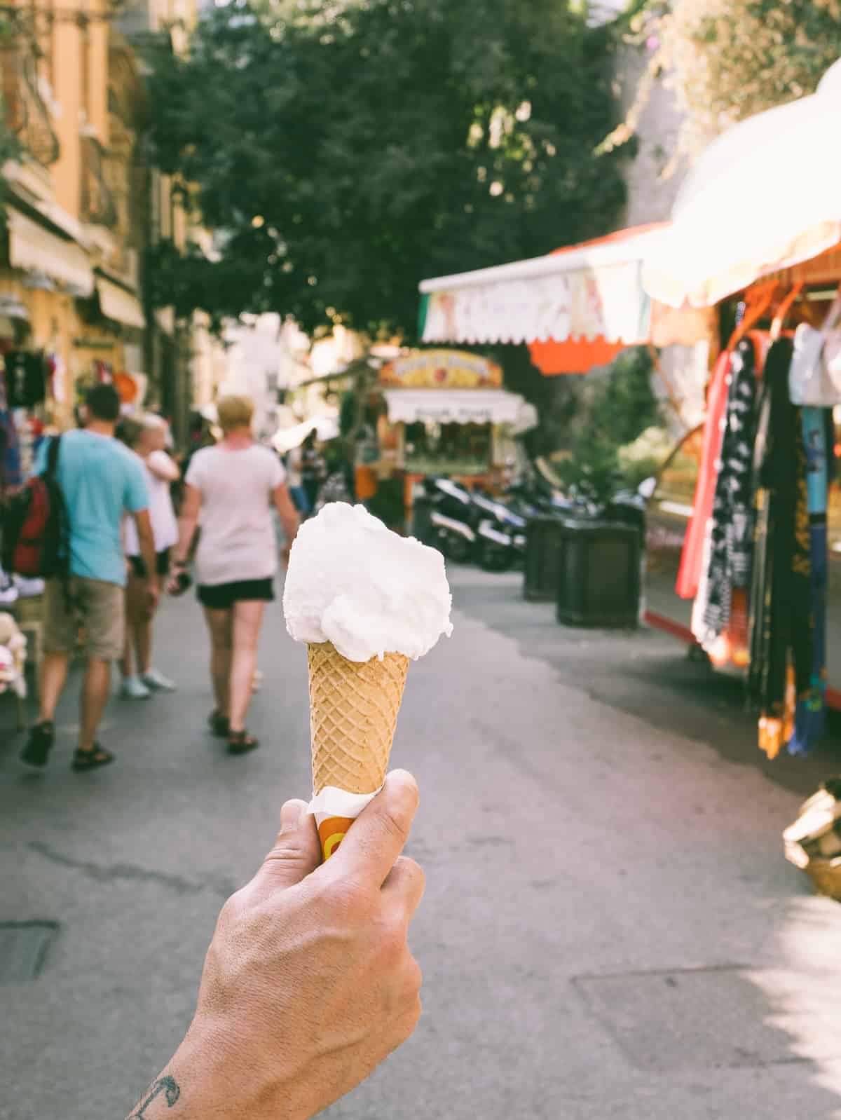 holding a lemon gelato in Taormina Sicily