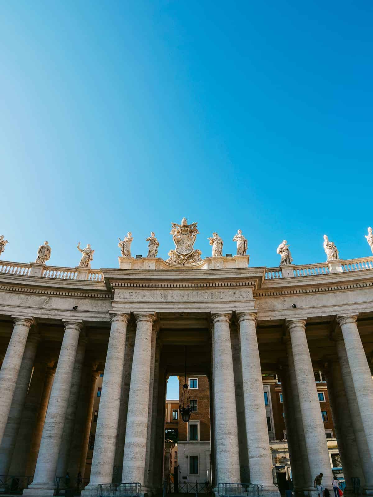 architecture and columns surrounding St Peter's Square Rome Italy