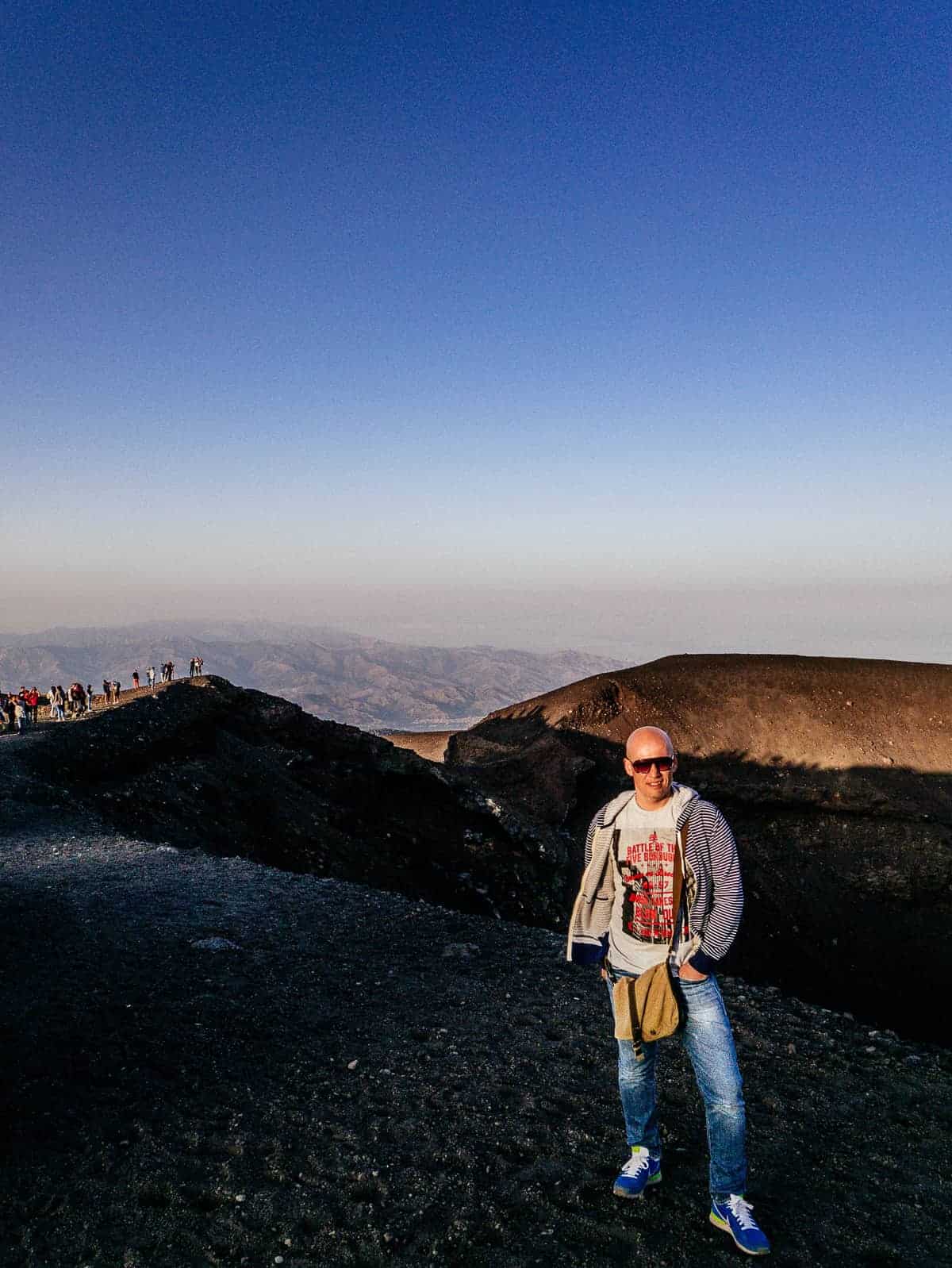 posing for a sunset picture at the base of Mount Etna Sicily Italy