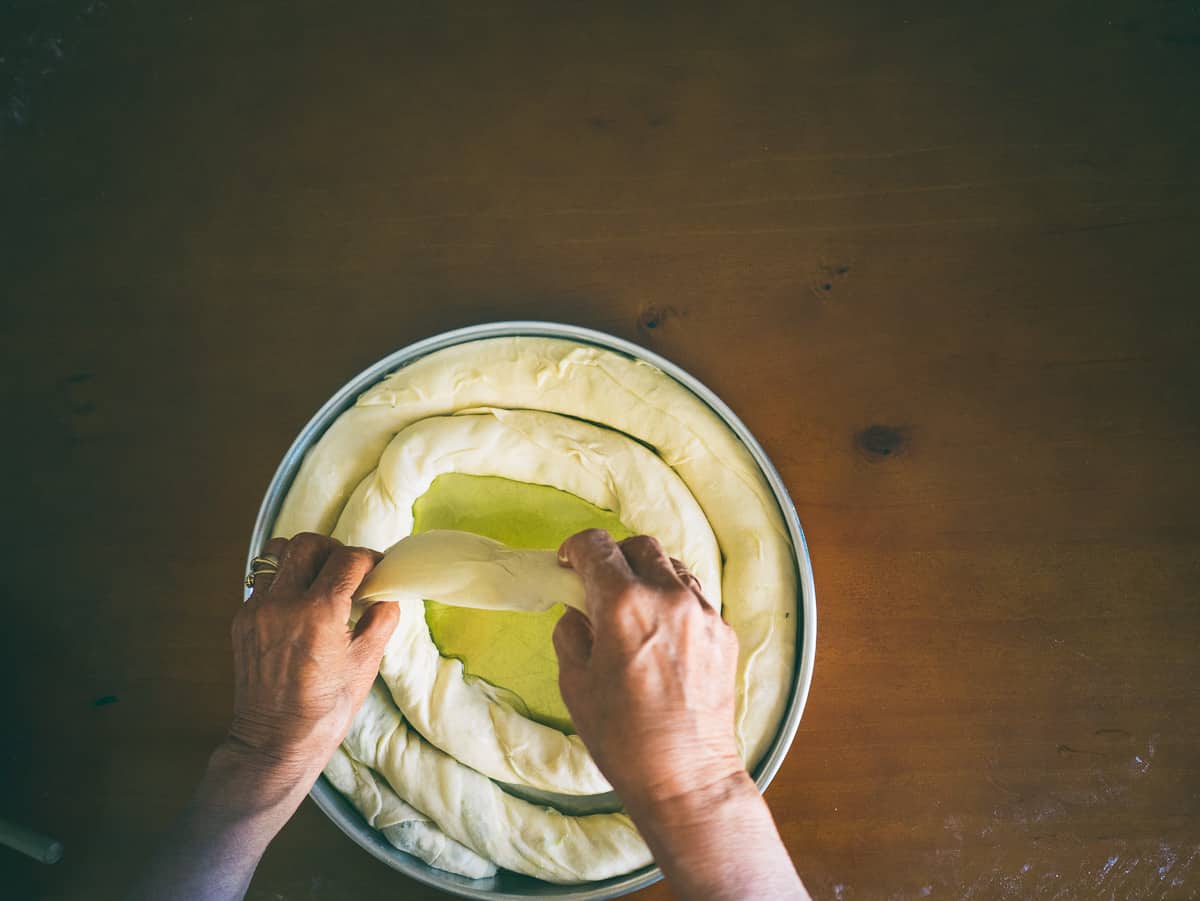 Greek spinach and feta pie placed in a baking tray