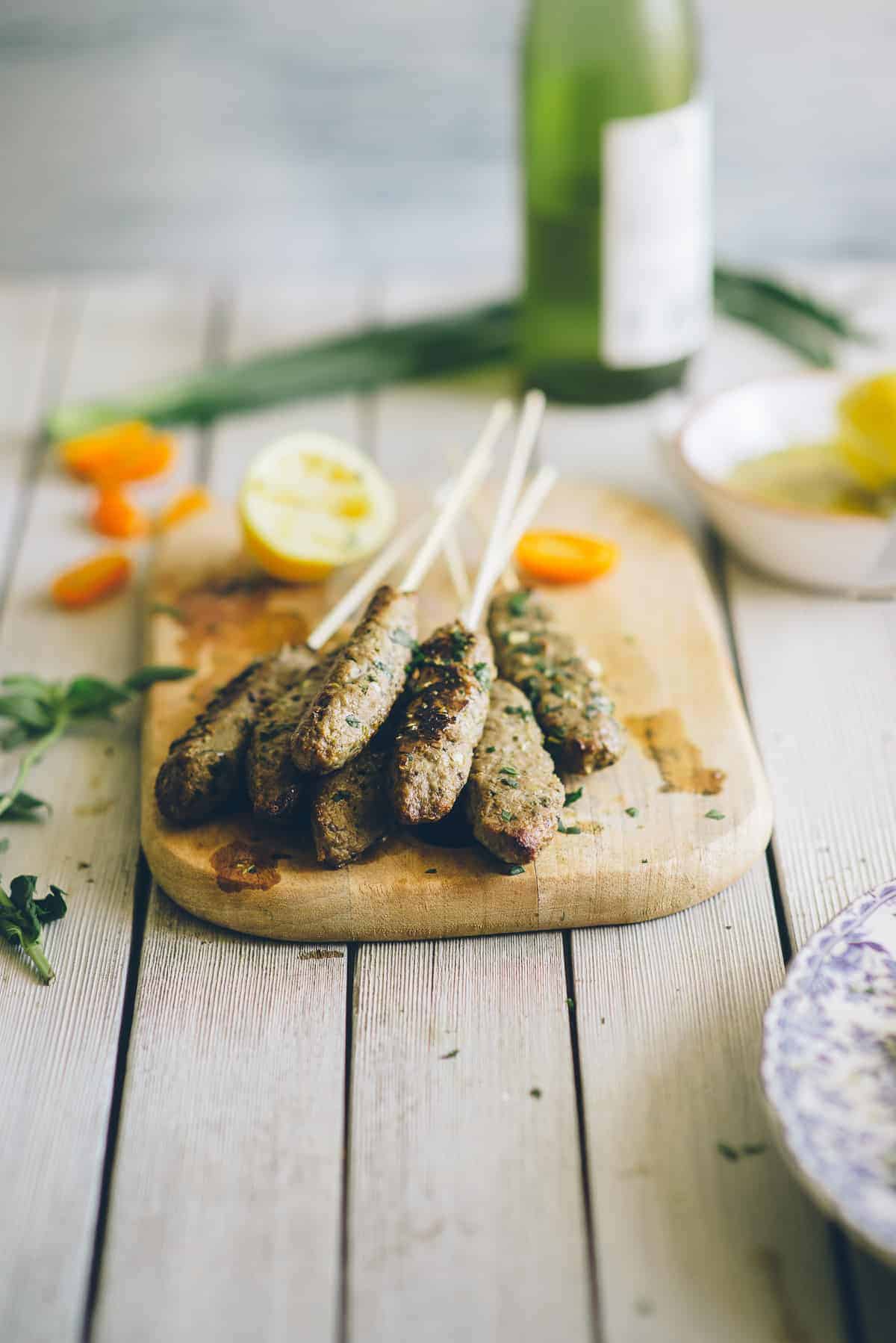 Middle Eastern beef meatballs served on a chopping board