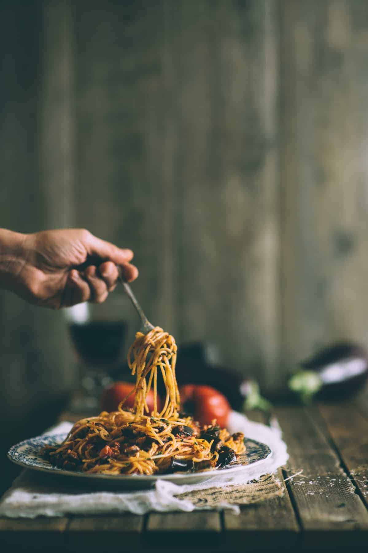 twirling pasta on a fork