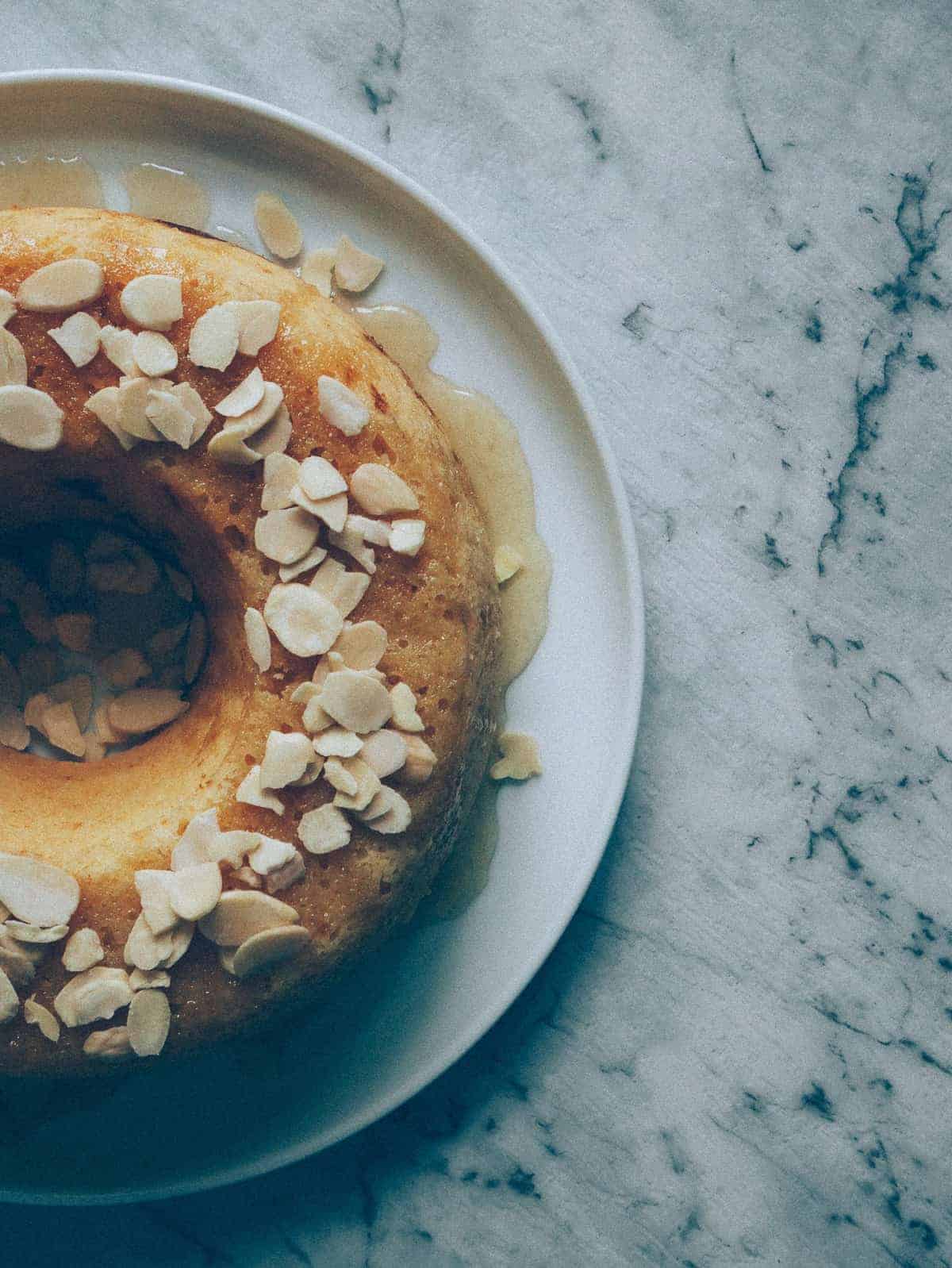 a lemon and ricotta cake on a plate