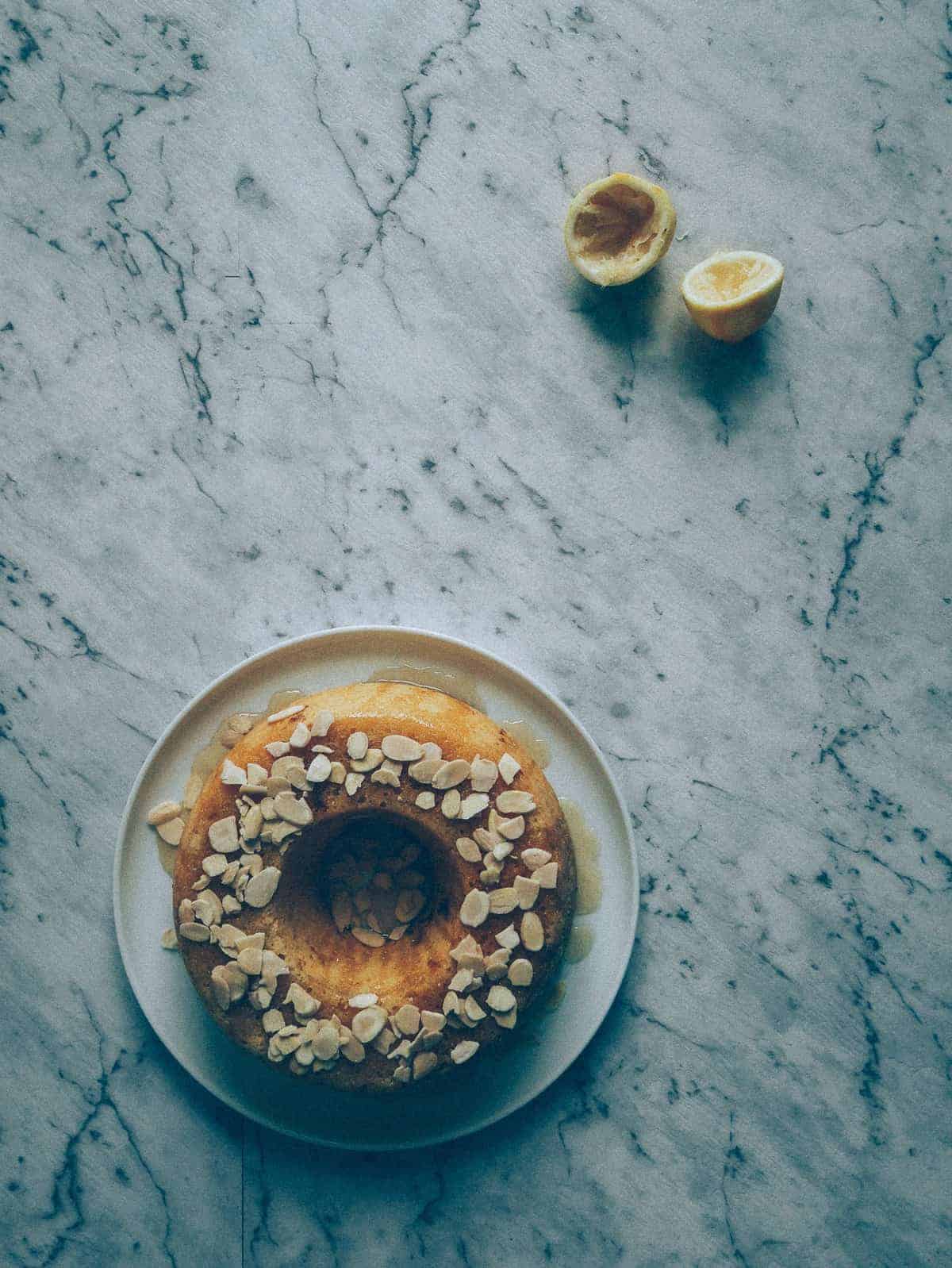 a cake made with lemons and ricotta  served on a table