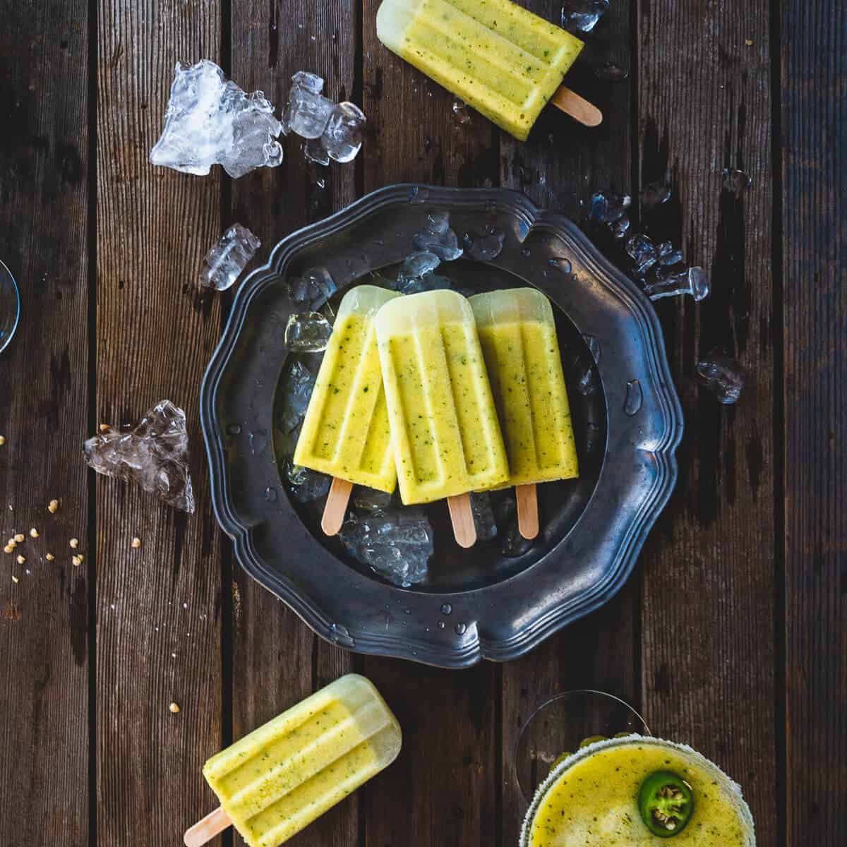 Pineapple Margarita ice pos served on a plate