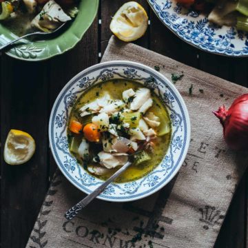 fish and vegetable soup served in a bowl