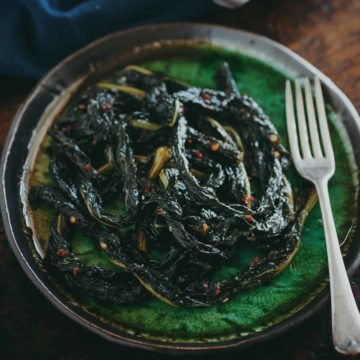 braised cavolo nero on a green plate