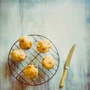 five scones on a wire rack