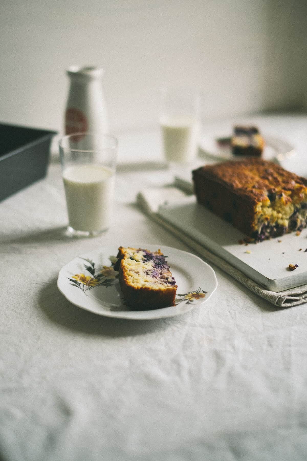 a slice of cake served on a plate on a table