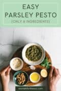 pin for easy parsley walnut pesto with text and a board with all the ingredients measured out.