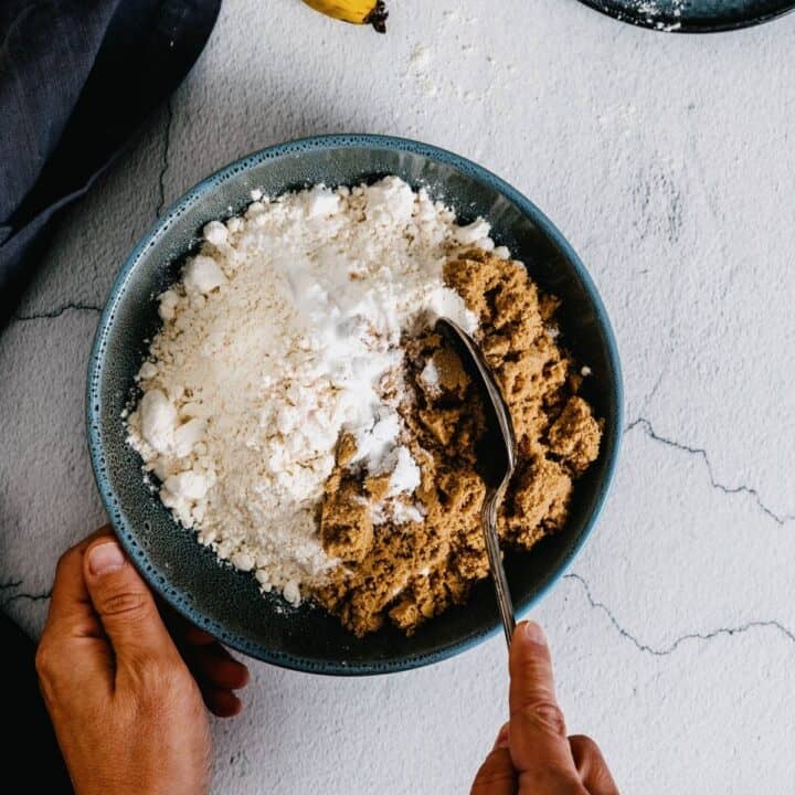 combining flour, brown sugar and baking powder and soda in a bowl.