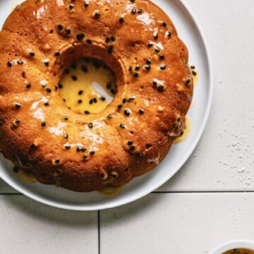 mango coconut cake on a tiled surface.
