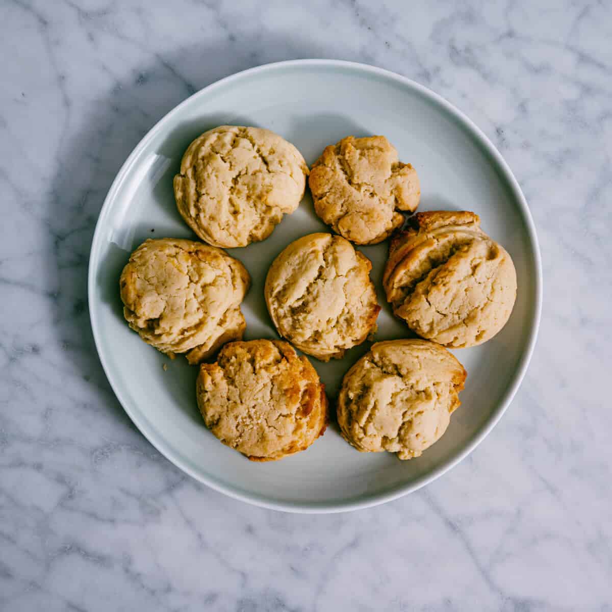 vegan lemon cookies on a plate.