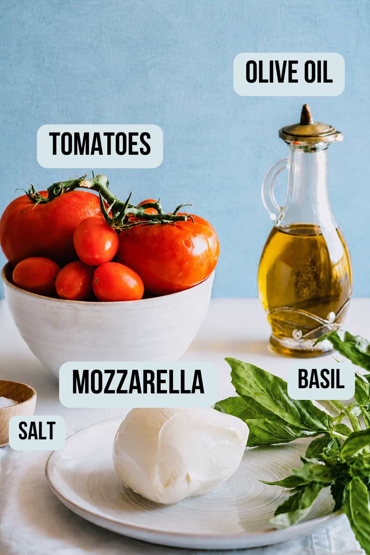tomatoes mozzarella basil and olive oil for caprese bruschetta.