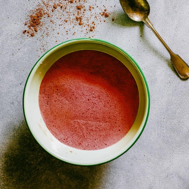 Wet ingredients for chocolate beetroot cake blended in a bowl.