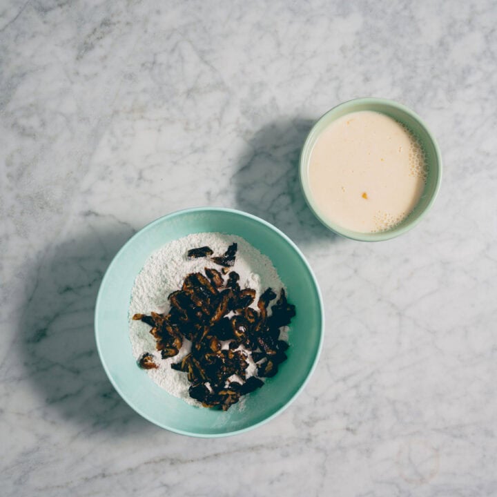 flour and chopped medjool dates in bowl with buttermilk mixture for date scones.
